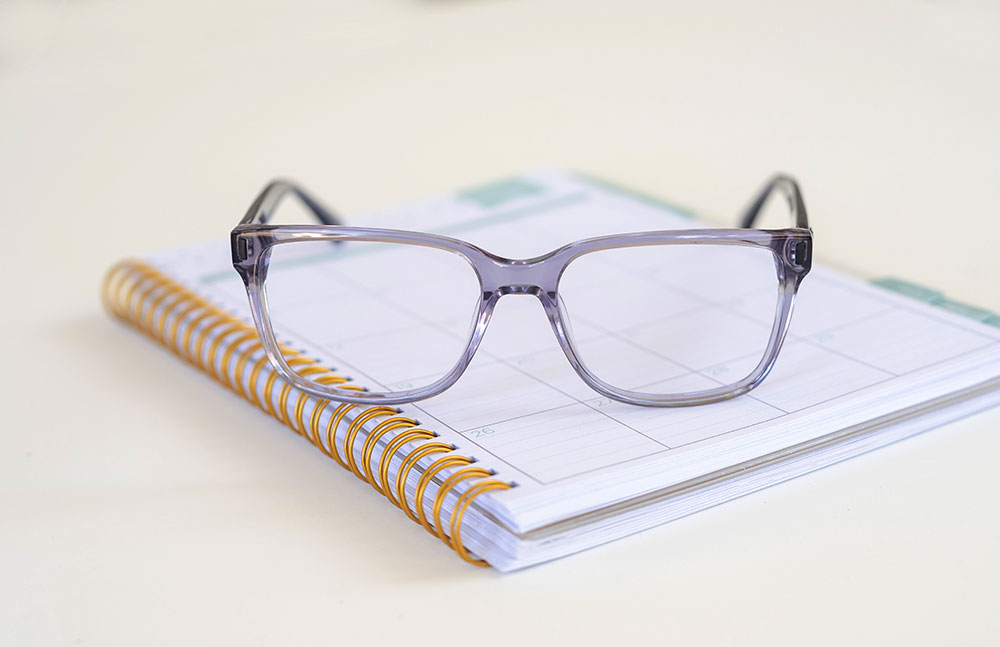 Isolated eyewear on notepad